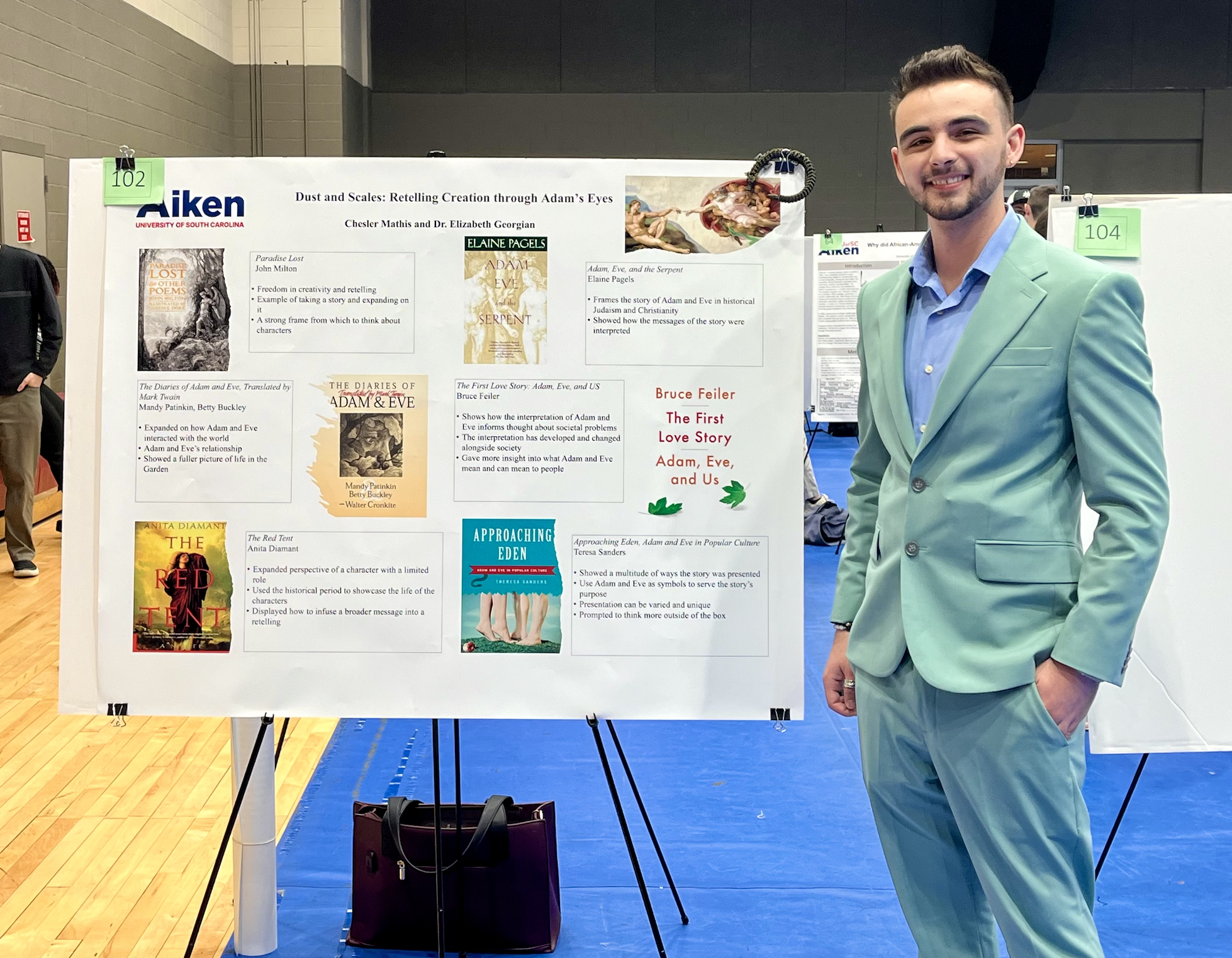 Photo of Ches Matthis at USCA Scholar Showcase with his poster “Dust and Scales, Retelling Creation through Adam’s Eyes.”