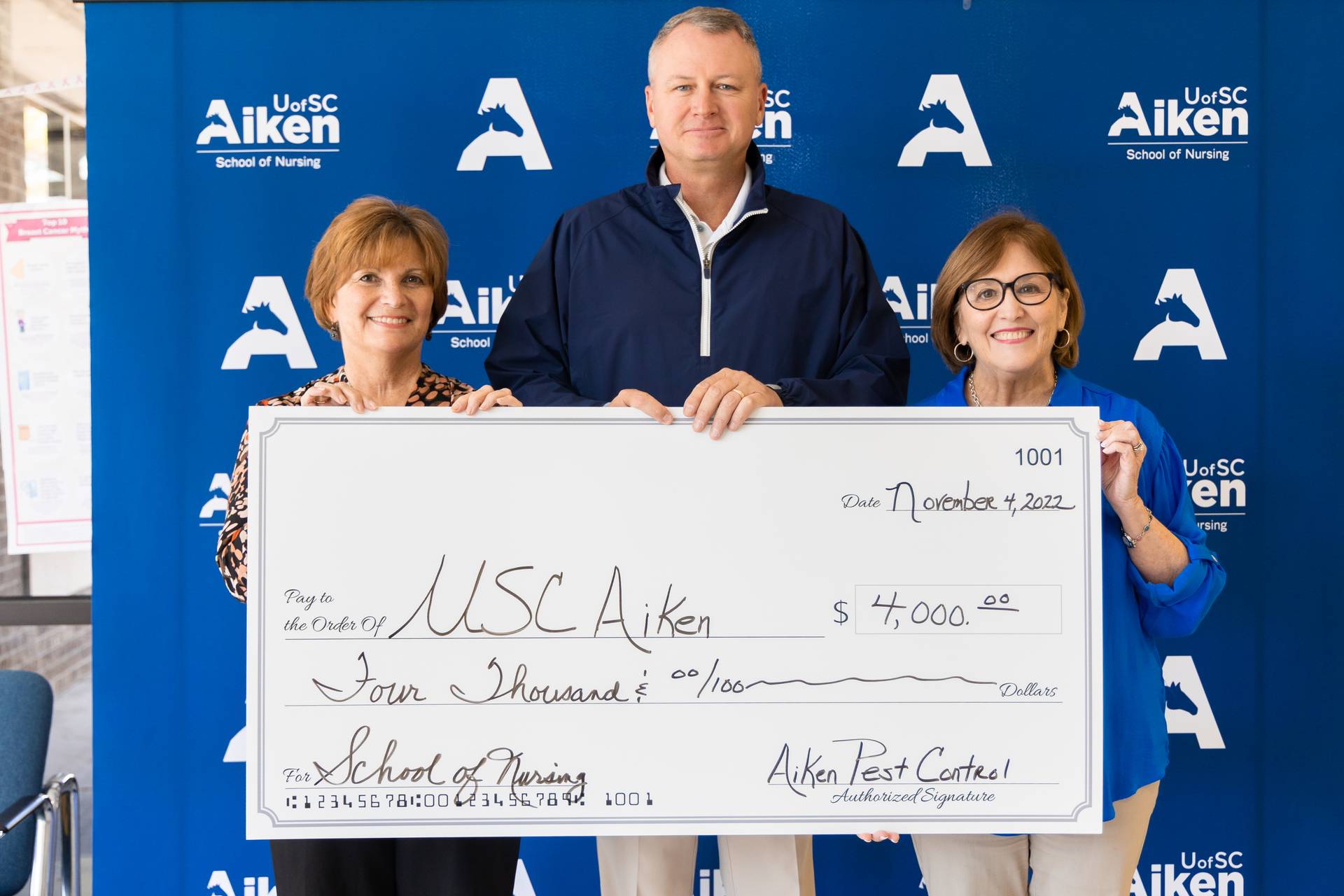 Aiken Pest Control presents donation to benefit the School of Nursing