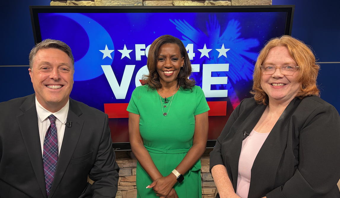 From left to right: Trent Butler (evening anchor), Kimberely Scott (evening anchor), Dr. Sarah Young (USCA associate professor)