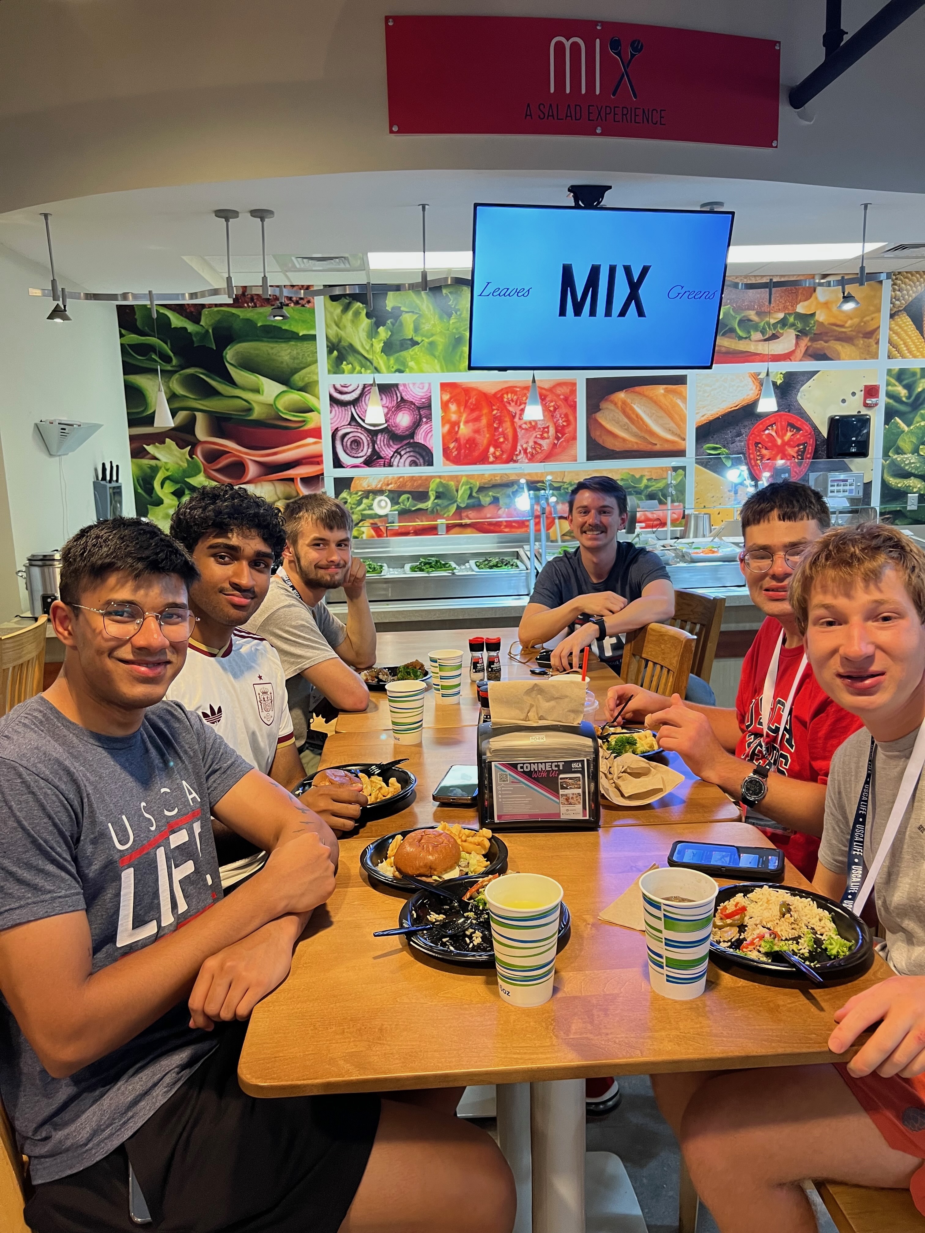 USCA LIFE students and LRA eating dinner in the Café.