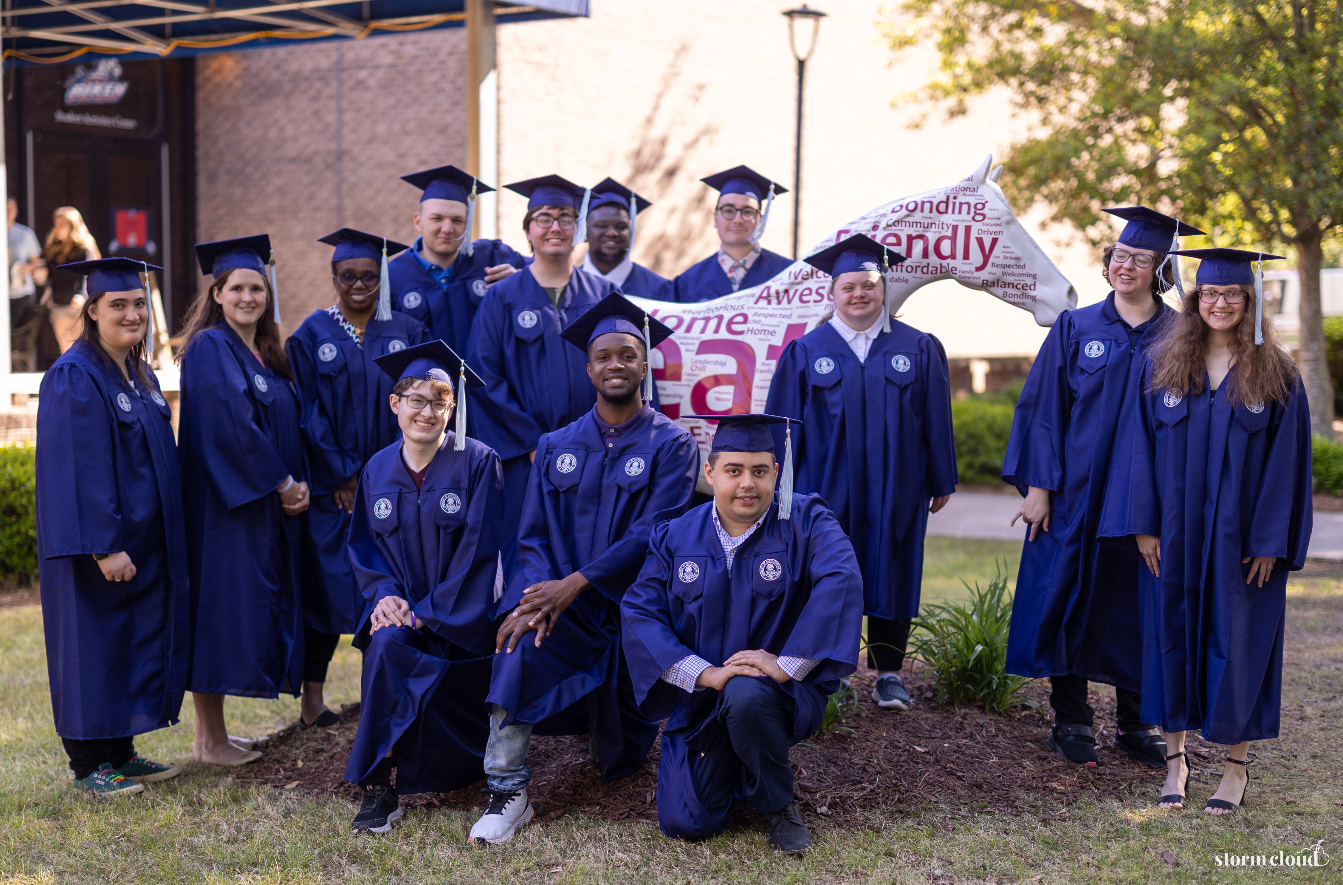 2025 USCA LIFE graduates pose for a photo outside the student activity center